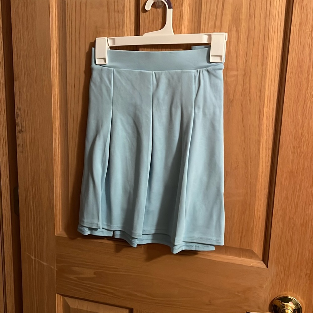 Light Blue Skirt. NEVER WORN